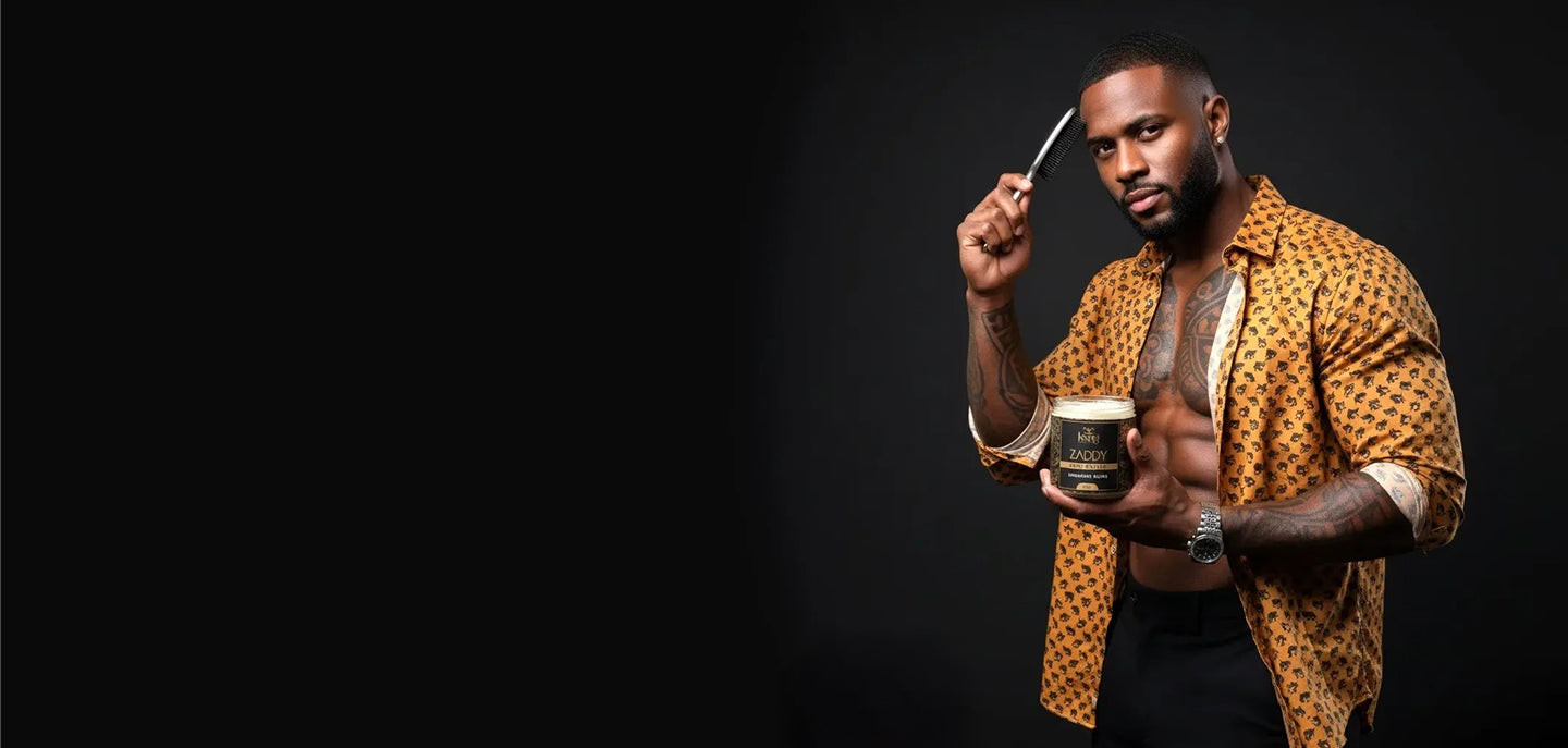 Man holding a can of beer with a black background